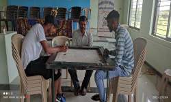 Sports Competition: Chess and Carrom
